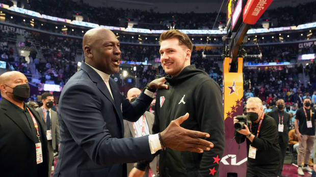 Michael Jordan and Luka Doncic share a moment at NBA All-Star Weekend in Cleveland during the 2021-22 season.